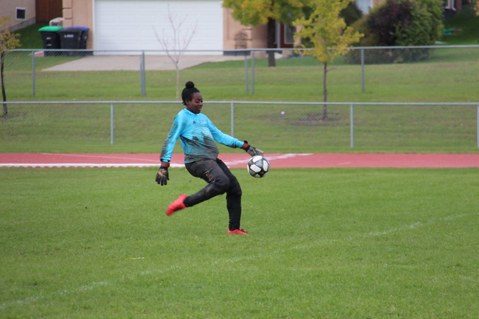 Women's Soccer Most Valuable Player is awarded to goalie Telecia Dowsett. 