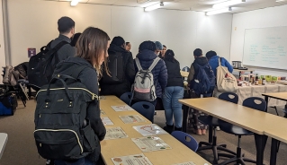 Students at Food Adventure event walking through the healthy eating display in a classroom.