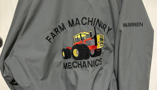Warren Cowling's grey Farm Machinery branded jacket from 1991.