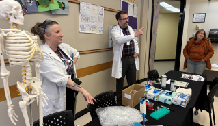 Staff from Assiniboine's School of Nursing leading a lab workshop in a classroom.