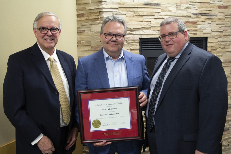 Assiniboine Community College Board of Governors Chair Jeff Harwood, Honorary Diploma Recipient Kelly McCrimmon, Assiniboine President Mark Frison