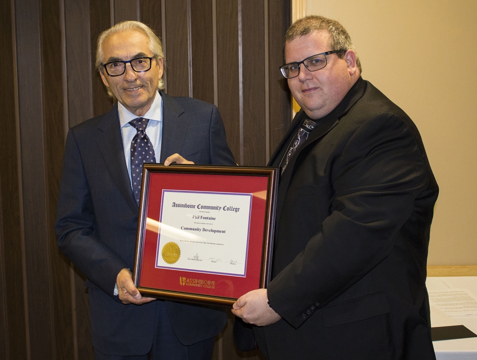 Phil Fontaine accepts an Honorary Diploma in Community Development at Assiniboine's Graduation Ceremony, June 1, 2017.