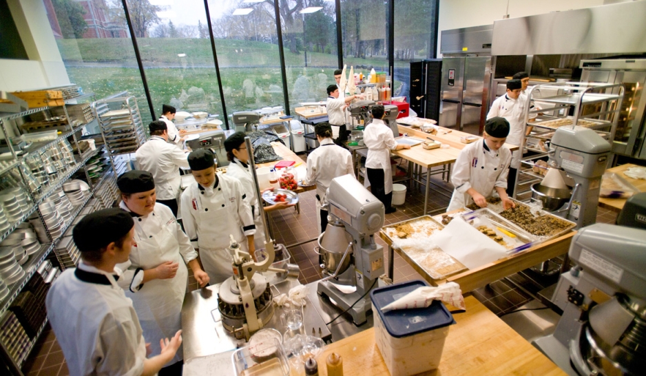 Culinary students inside kitchen