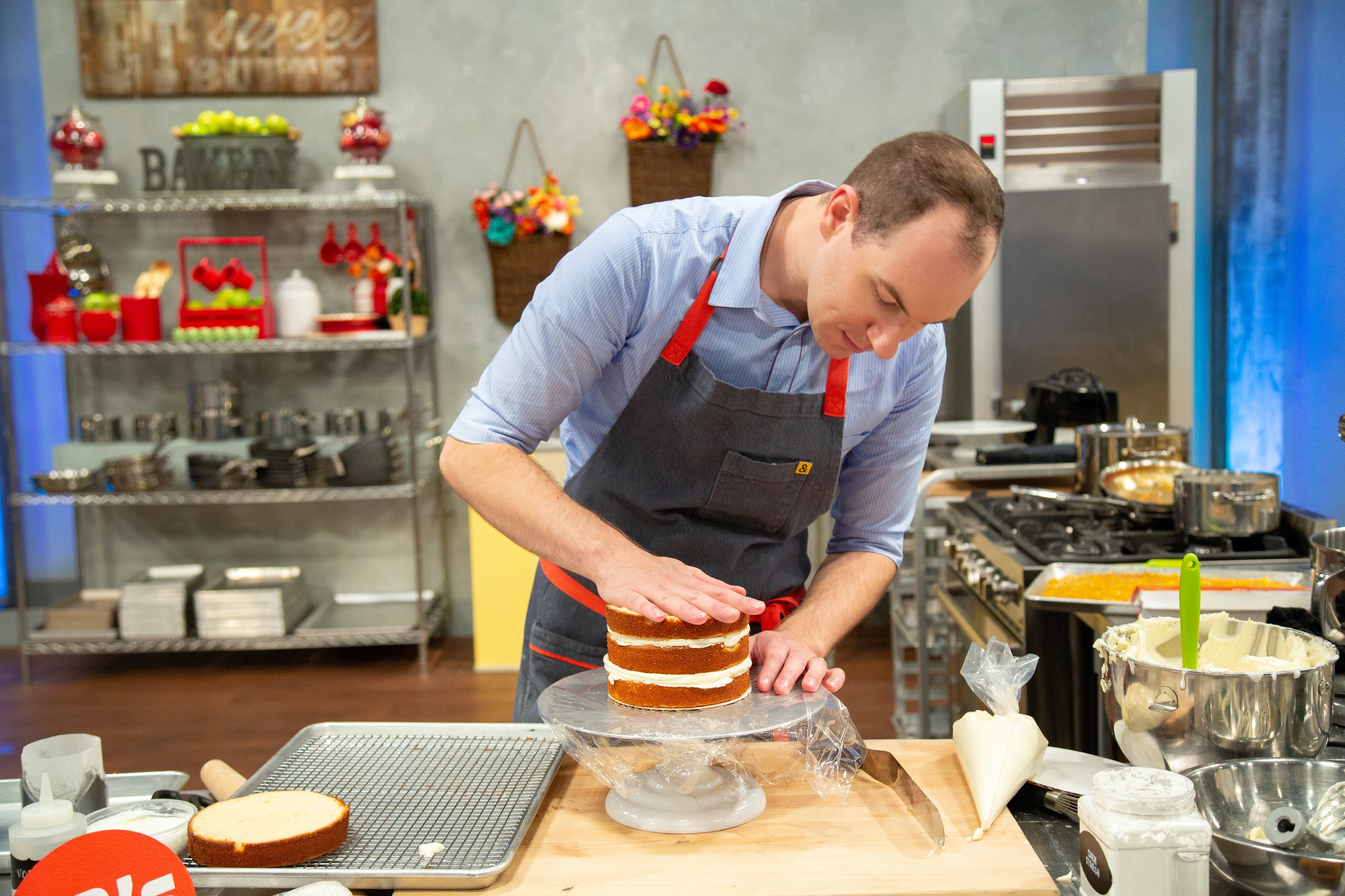 Arin working on his cake, as seen on Spring Baking Championship