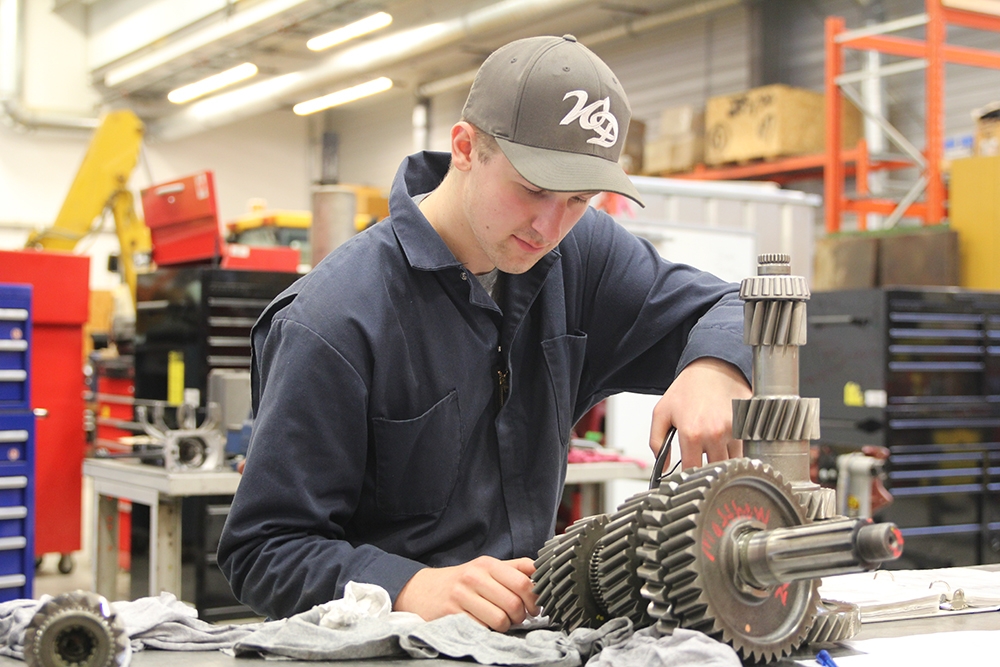 Vaughn Zimmer working in trades shop.