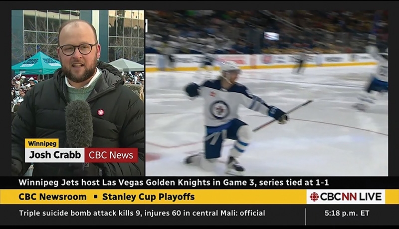Screenshot of a CBC News program with Josh Crabb commenting on a Jets hockey game.