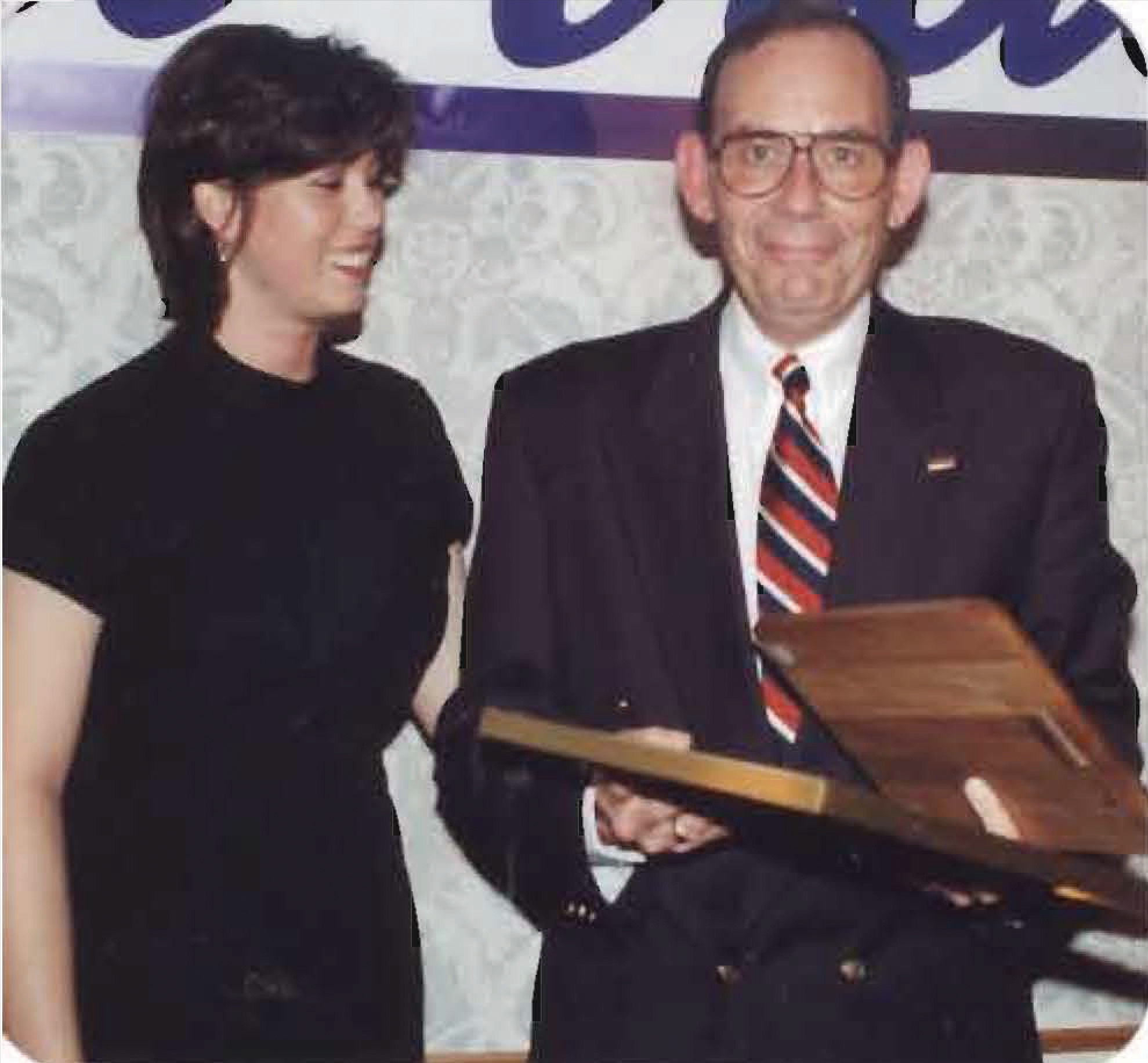 Lisa Huston standing next to Tim Ryan, a Business Administration instructor at the time.