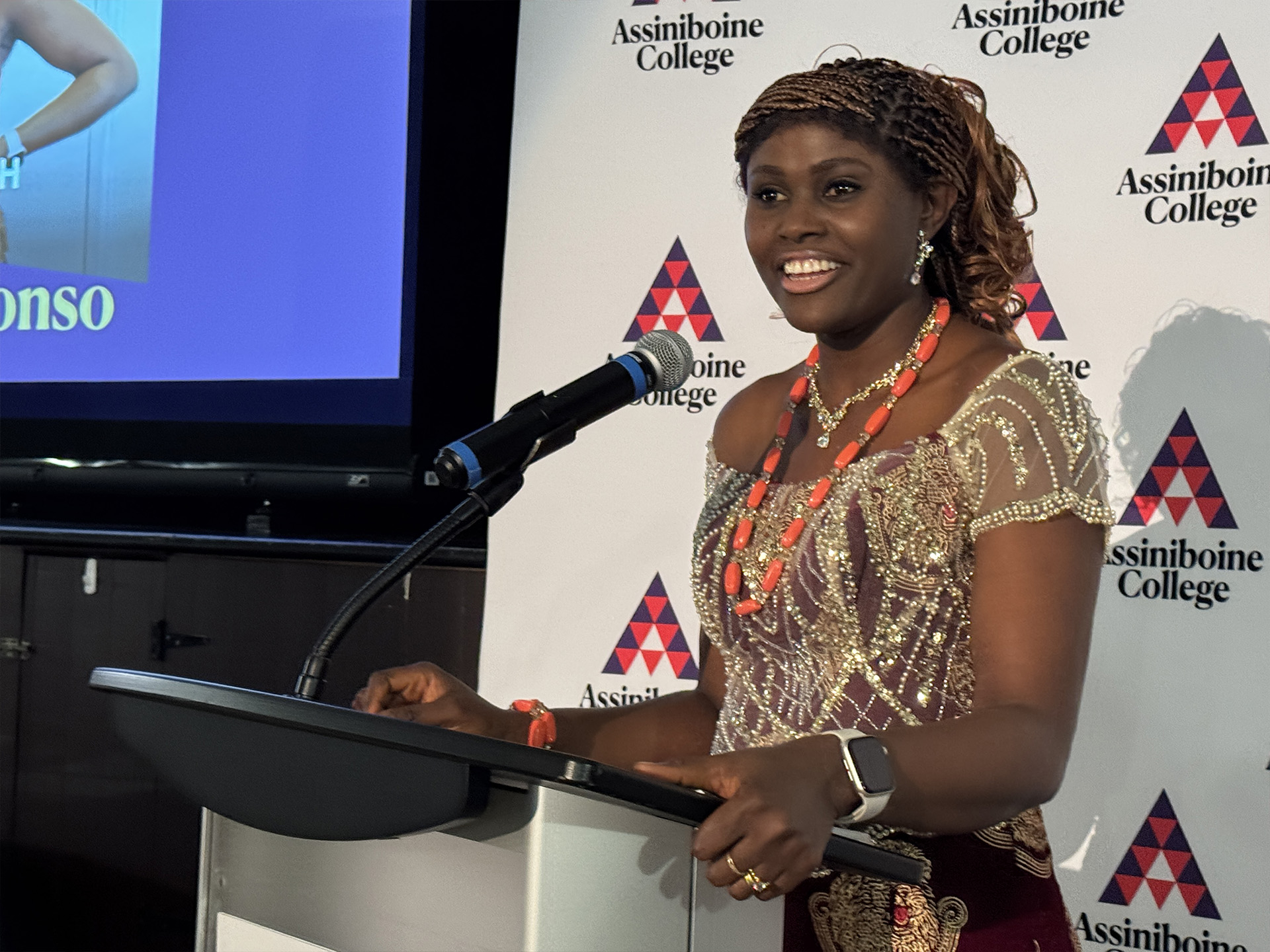 Blessing Chukwunonso making a speech at the annual Alumni Awards Event in Dauphin in 2025.
