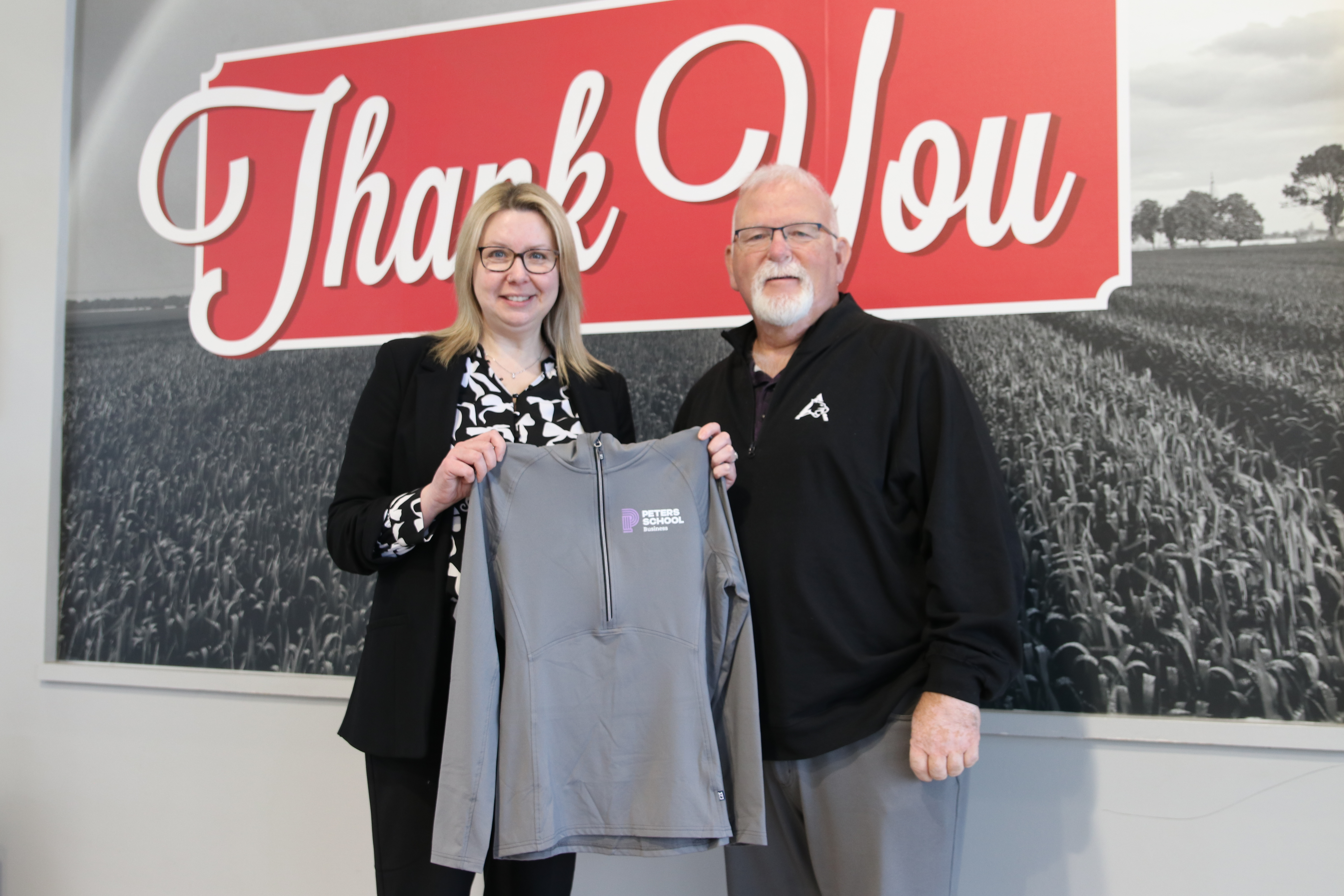 Heritage Co-op CEO Leanne DeVliegere with Peters School of Business Dean, Terry Burgess