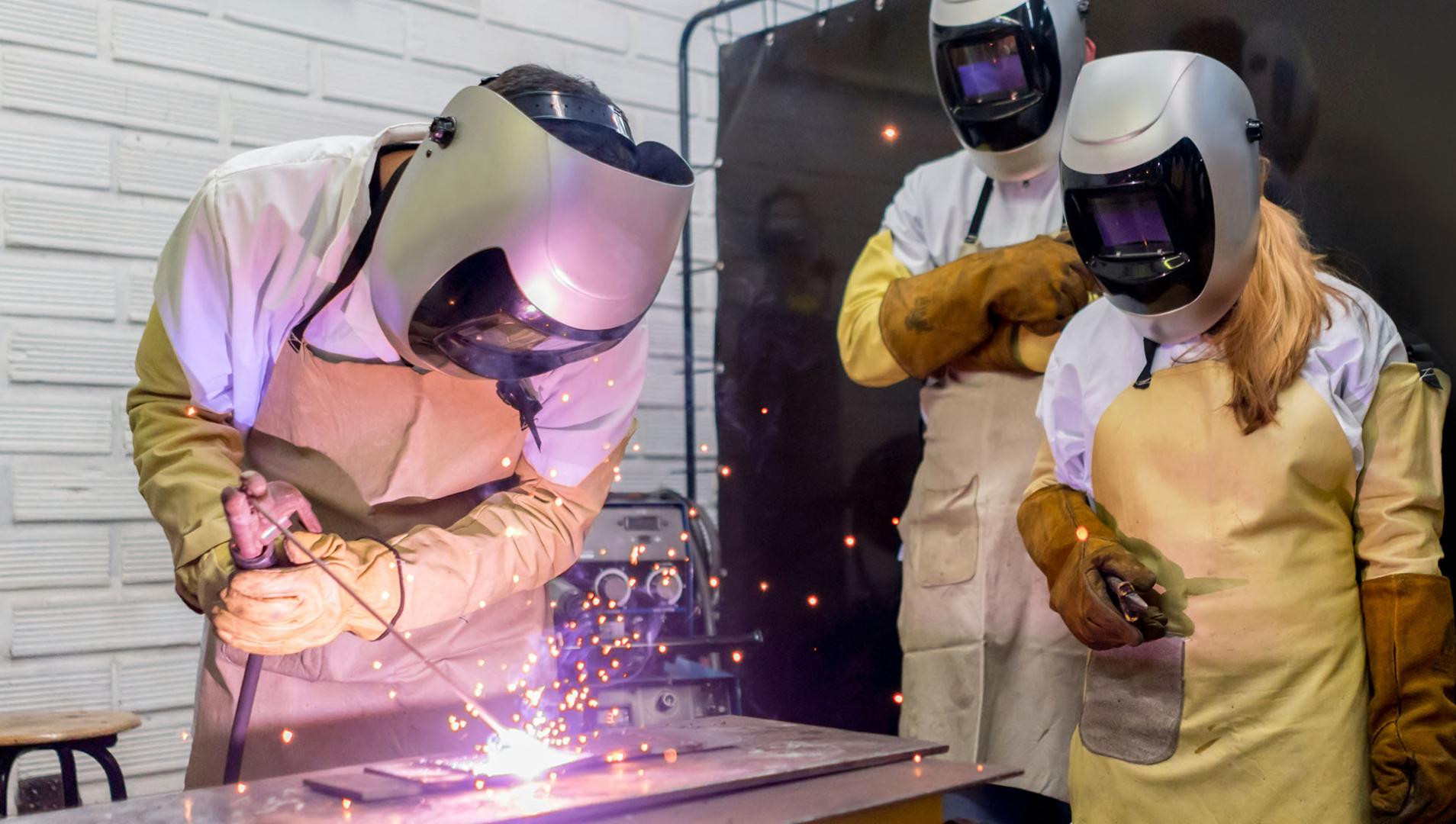 welding students in a classroom
