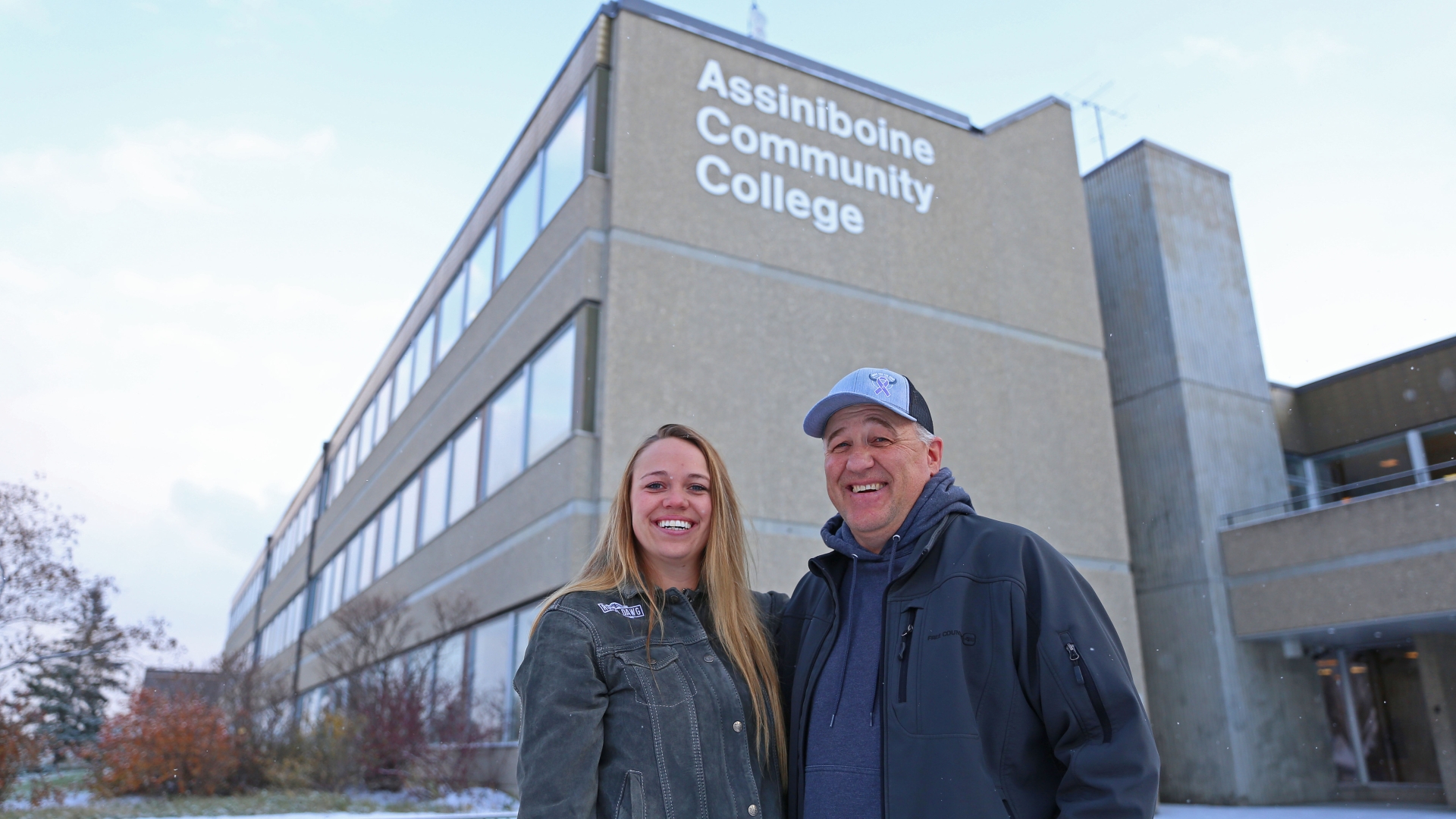 Tim and Kylie Gompf outside Assiniboine, where they both took agriculture programs. 