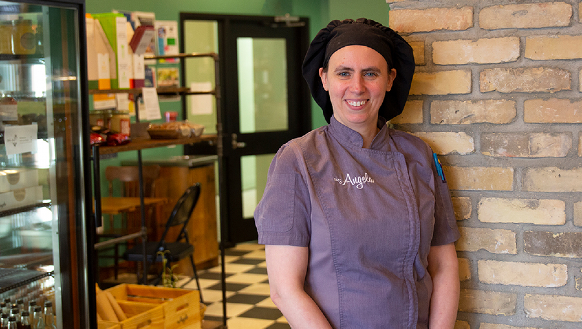 Culinary Grad, Angela Chambers in her bakery and restaurant