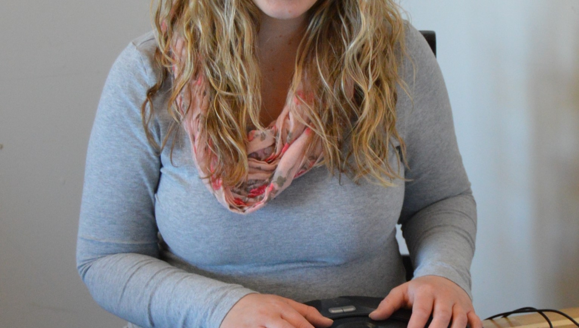 Erin Lambert, Manager of Recruitment & Conversion works at a remote office