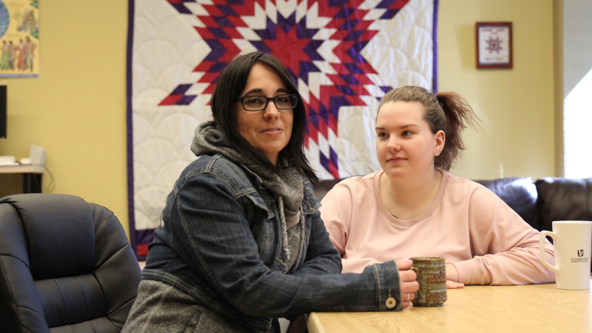 Social service worker students work at a table