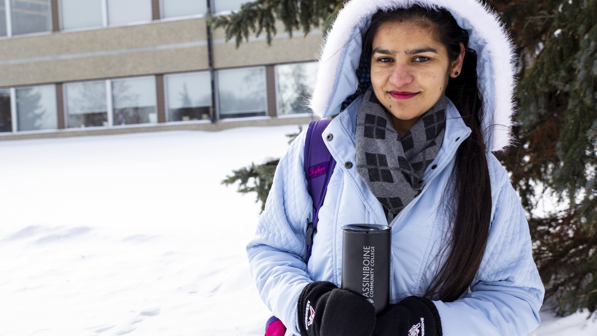 Student outdoors in the winter