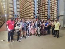 Italy group at parmesan cheese factory